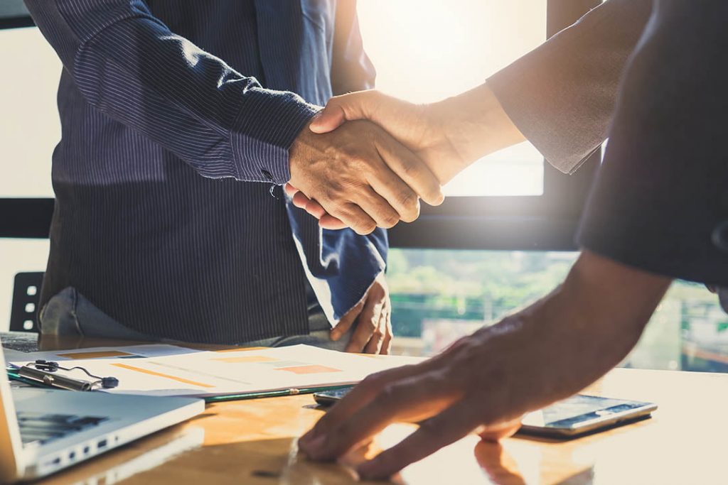 debt recovery partners hand shake