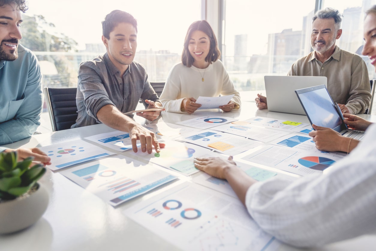 a group of experts analyzing project data