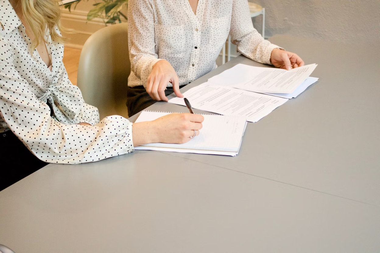 Business professionals reviewing financial documents