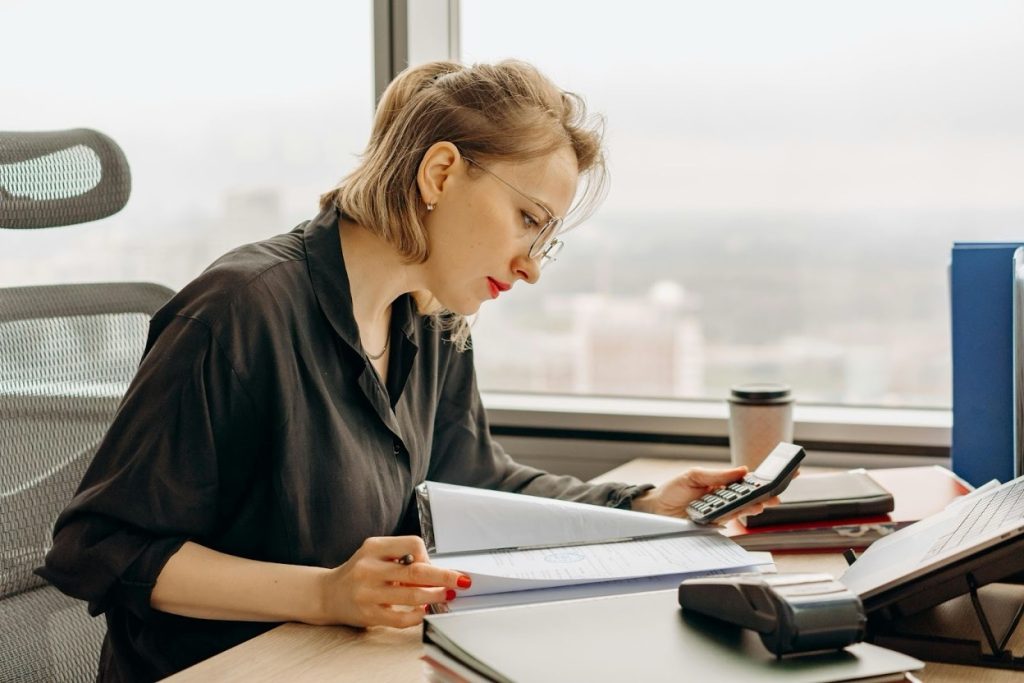 Property manager organizing tenant files and payment records