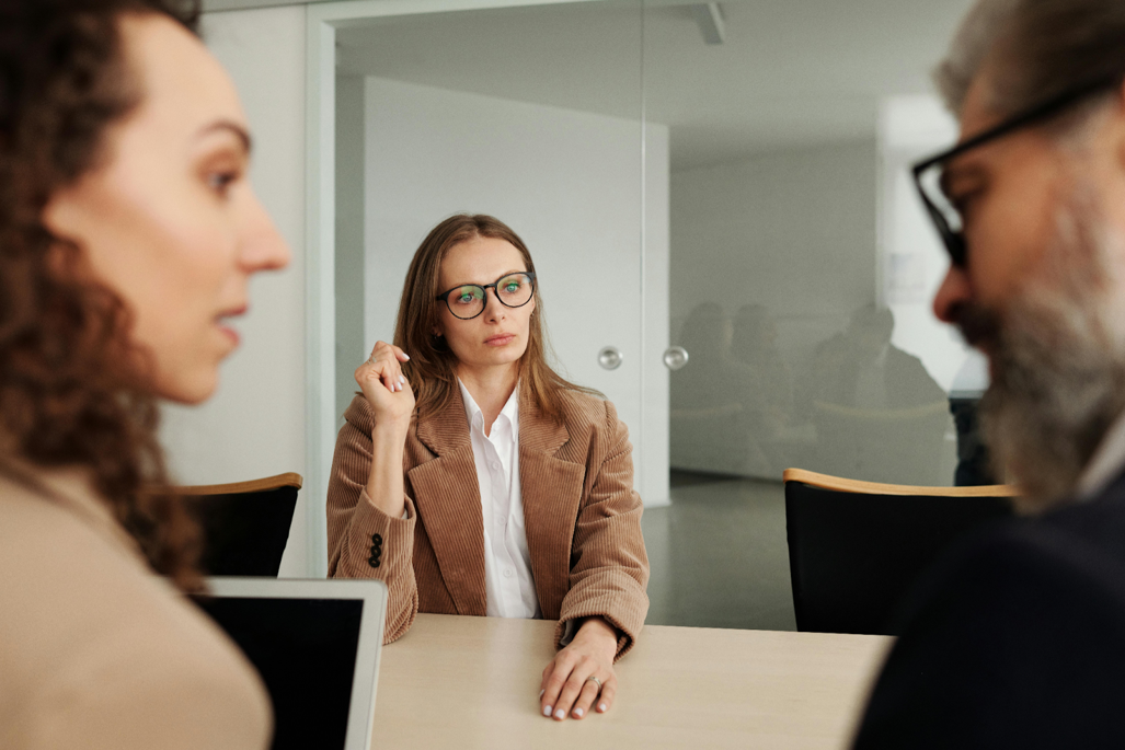 Business professional engaged in a meeting with stakeholders